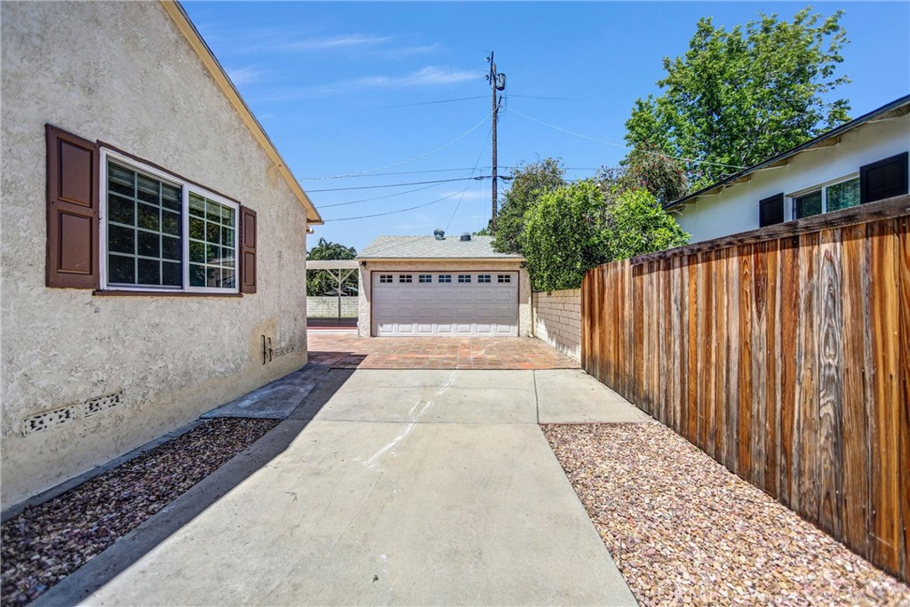 6225 Langdon Avenue Van Nuys, CA 91411 - Photo 13 of 15 a view of a backyard with potted plants