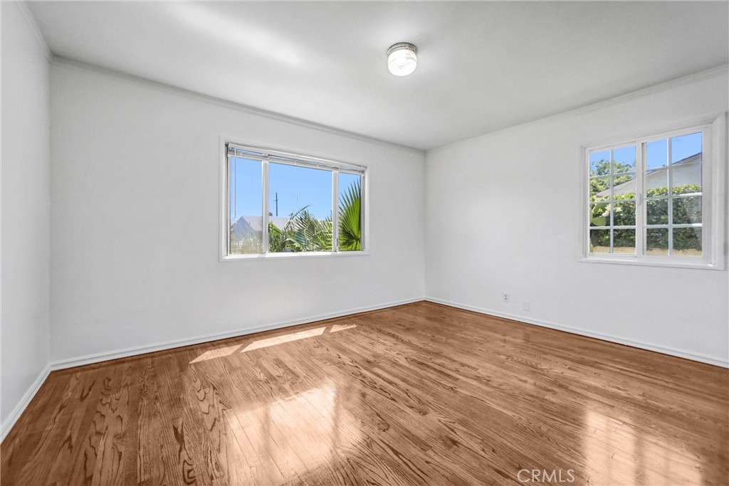 6225 Langdon Avenue Van Nuys, CA 91411 - Photo 9 of 15 an empty room with windows