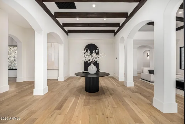 a bathroom with a sink and mirror