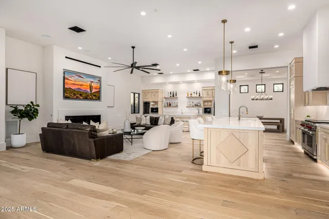 a room with gym equipment and a wooden floor
