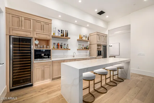 a bedroom with a bed and a view of bathroom