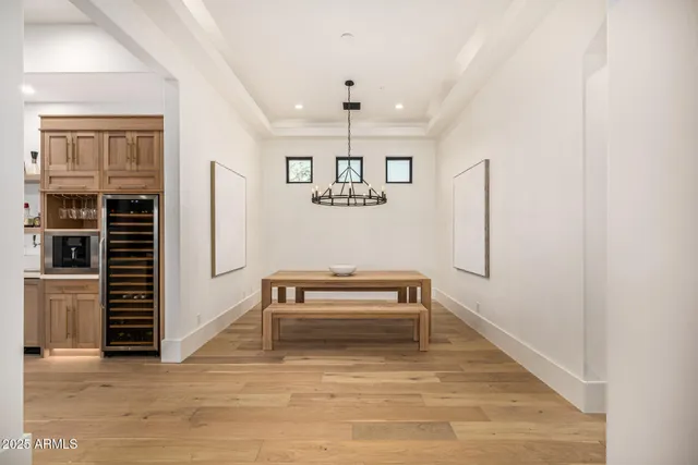 a bathroom with a double vanity sink mirror and toilet