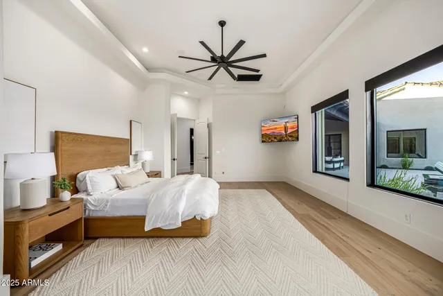 a view of a patio with table and chairs and potted plants