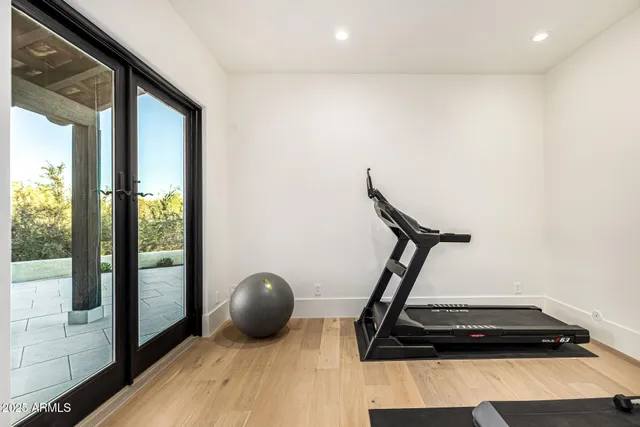 a view of living room with furniture and a fireplace