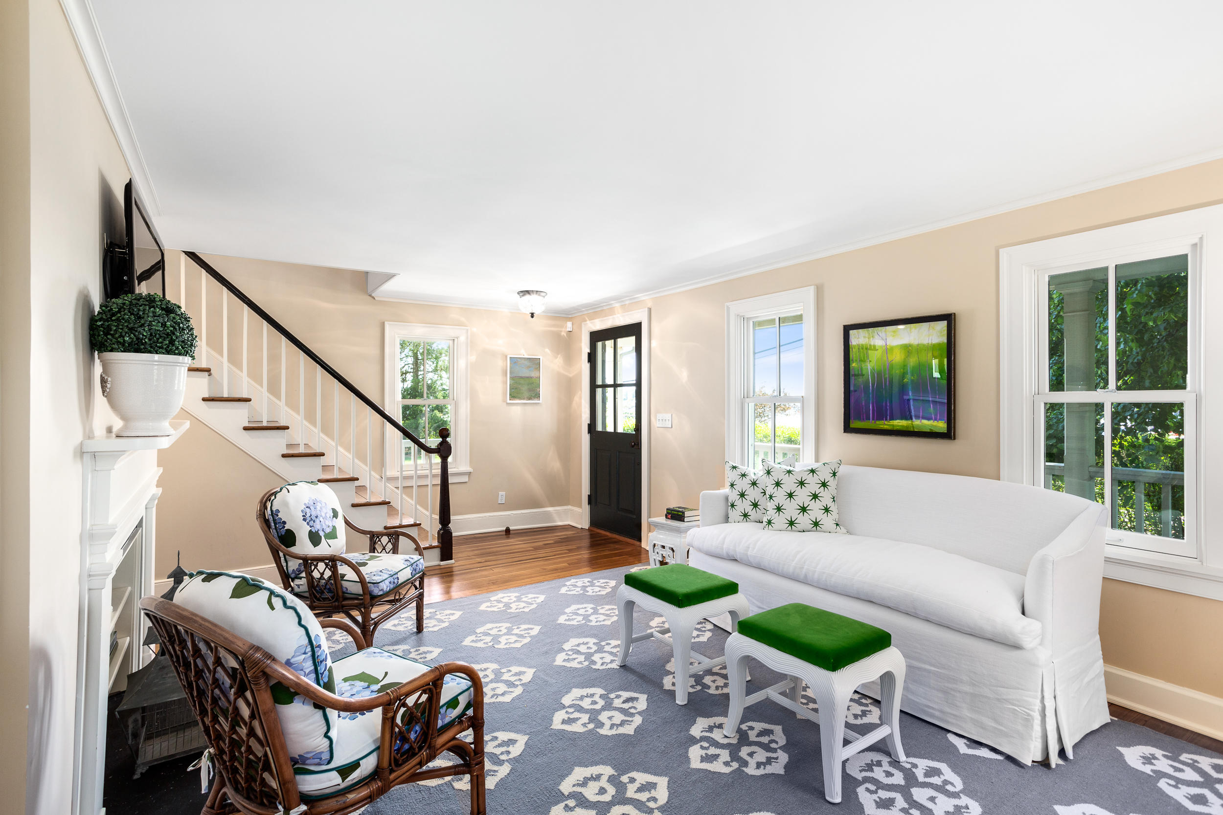 136 Pear Tree Point Road Darien, CT 06820 - Photo 11 of 56 a living room with furniture and wooden floor