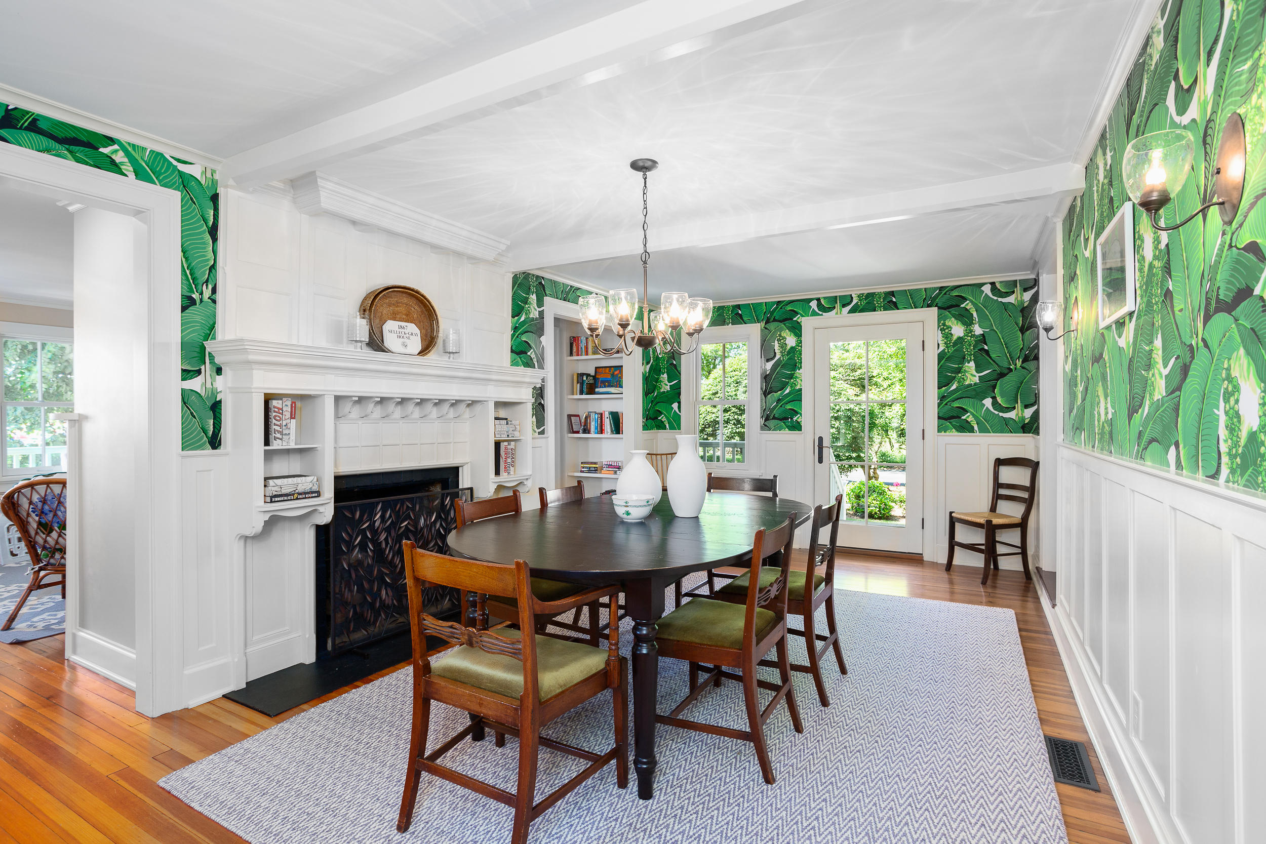136 Pear Tree Point Road Darien, CT 06820 - Photo 13 of 56 a dining room with furniture a fireplace and a large window