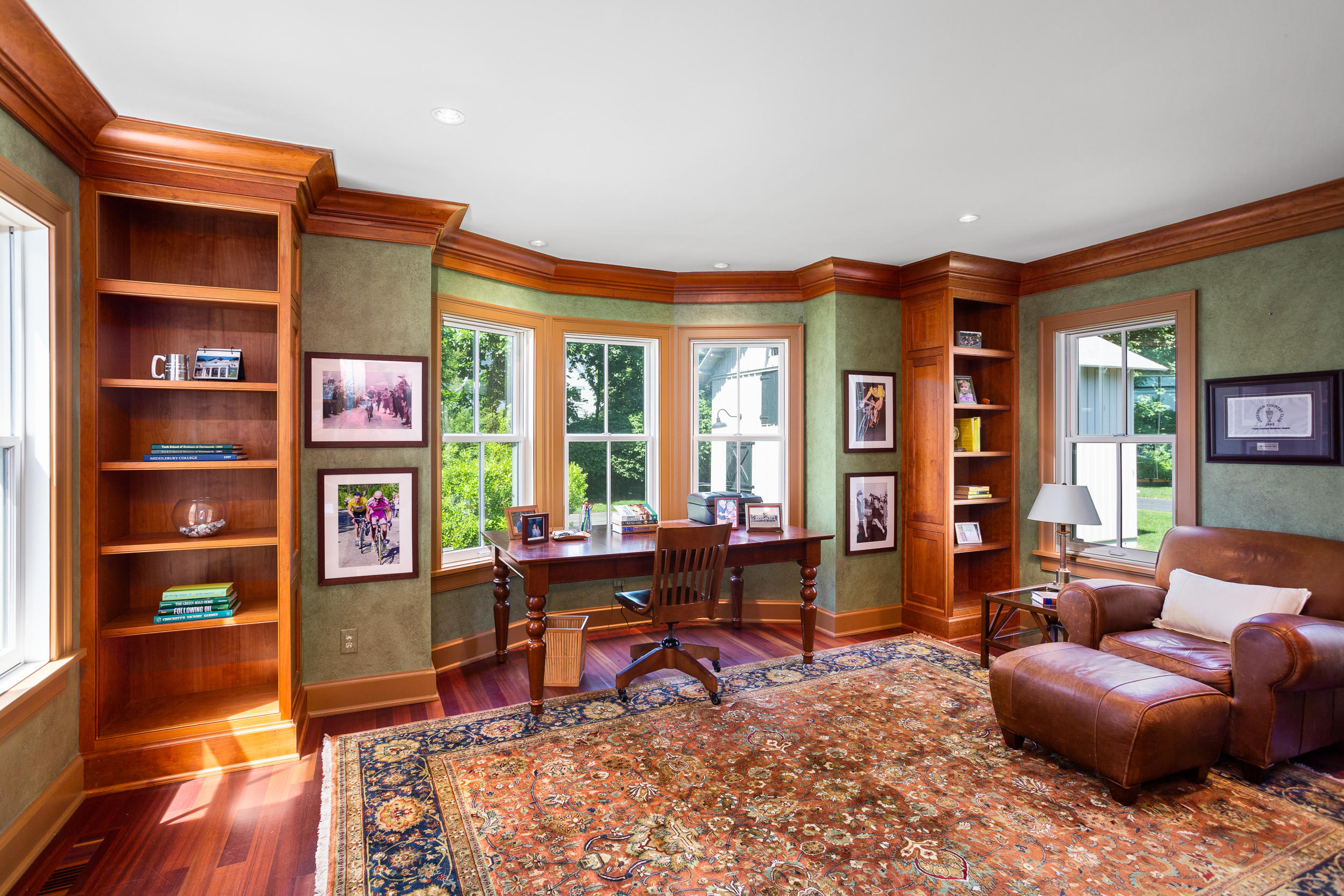 136 Pear Tree Point Road Darien, CT 06820 - Photo 14 of 56 a living room with furniture a rug and a floor to ceiling window