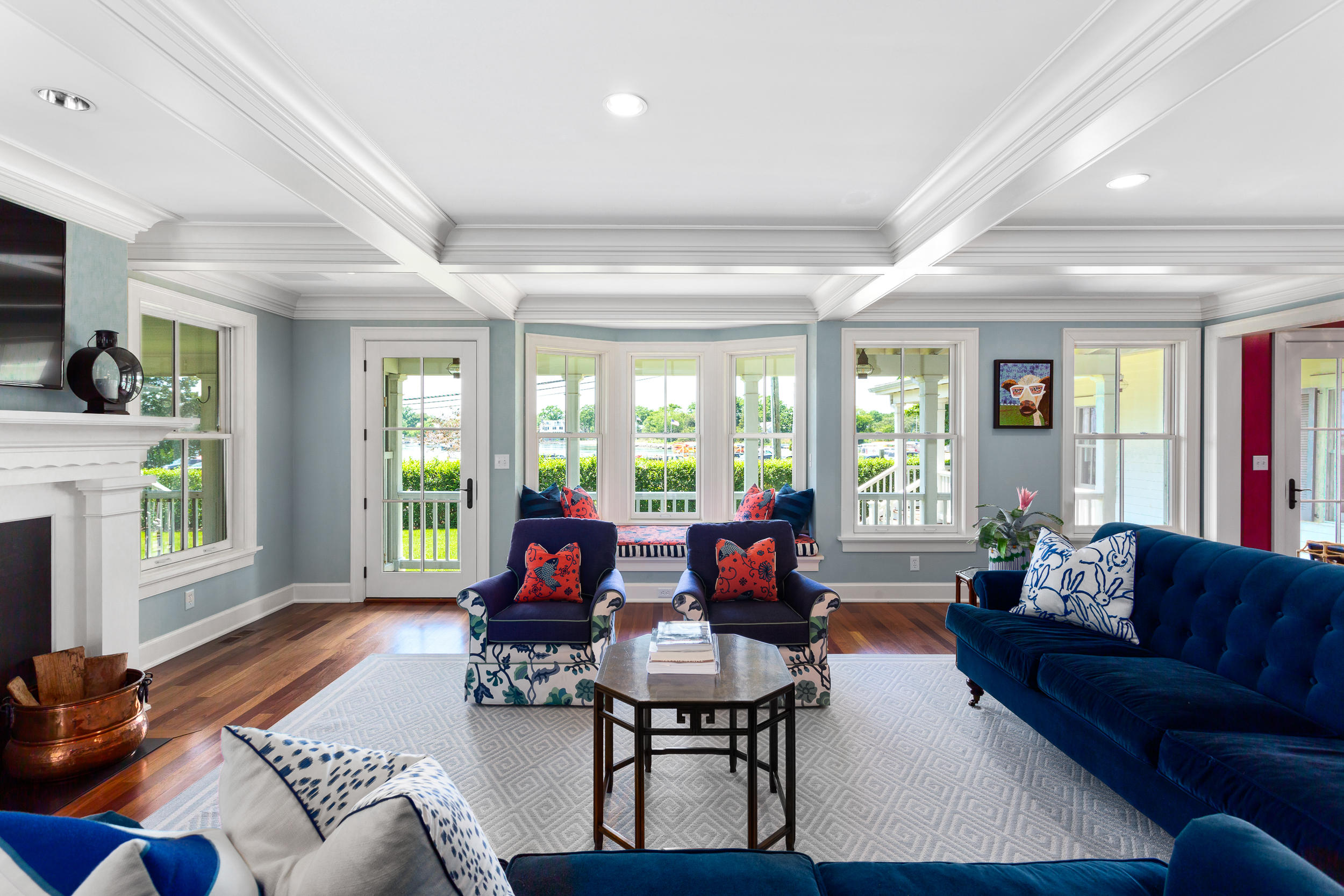 136 Pear Tree Point Road Darien, CT 06820 - Photo 20 of 56 a living room with furniture and a large window