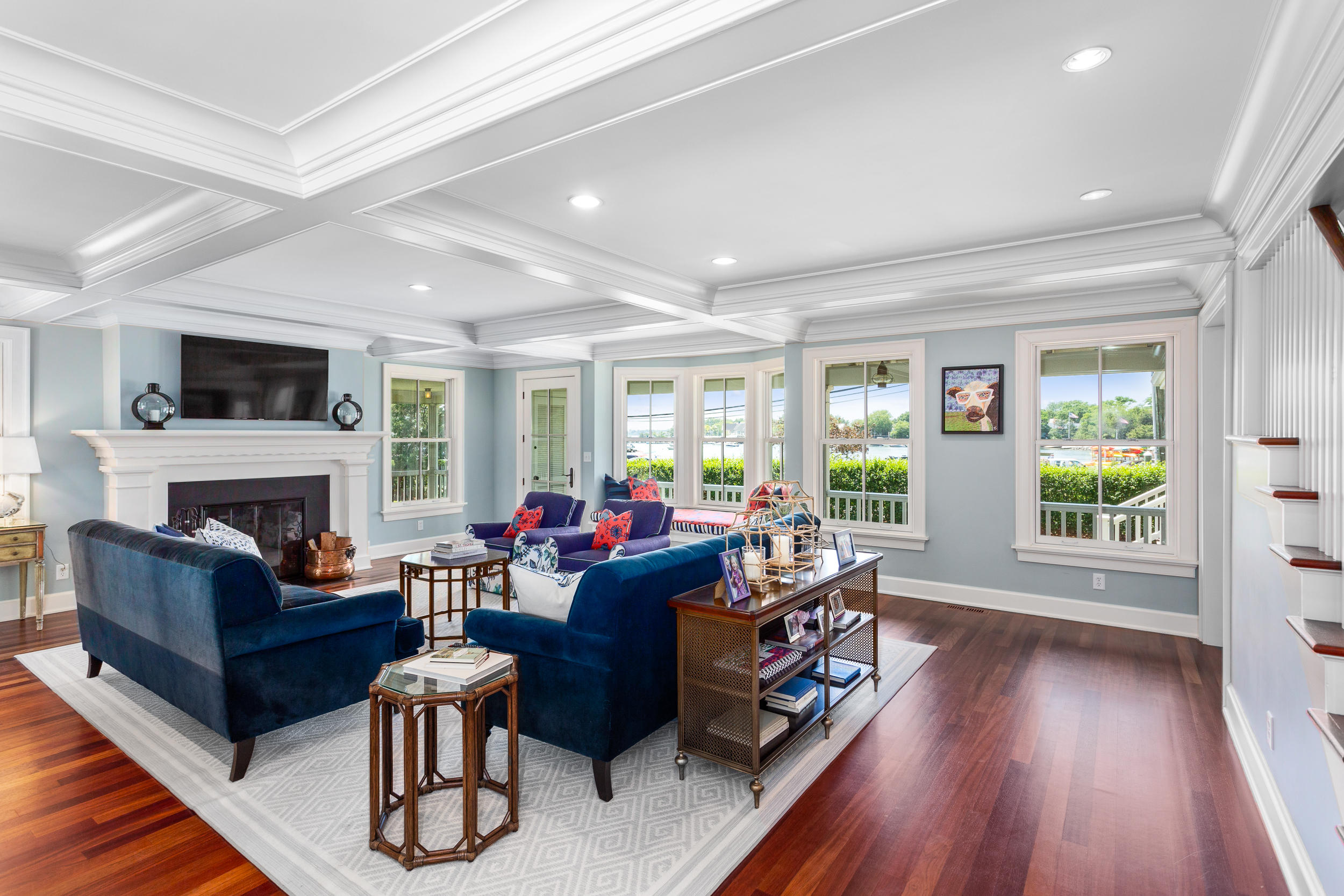136 Pear Tree Point Road Darien, CT 06820 - Photo 21 of 56 a living room with fireplace furniture and a wooden floor