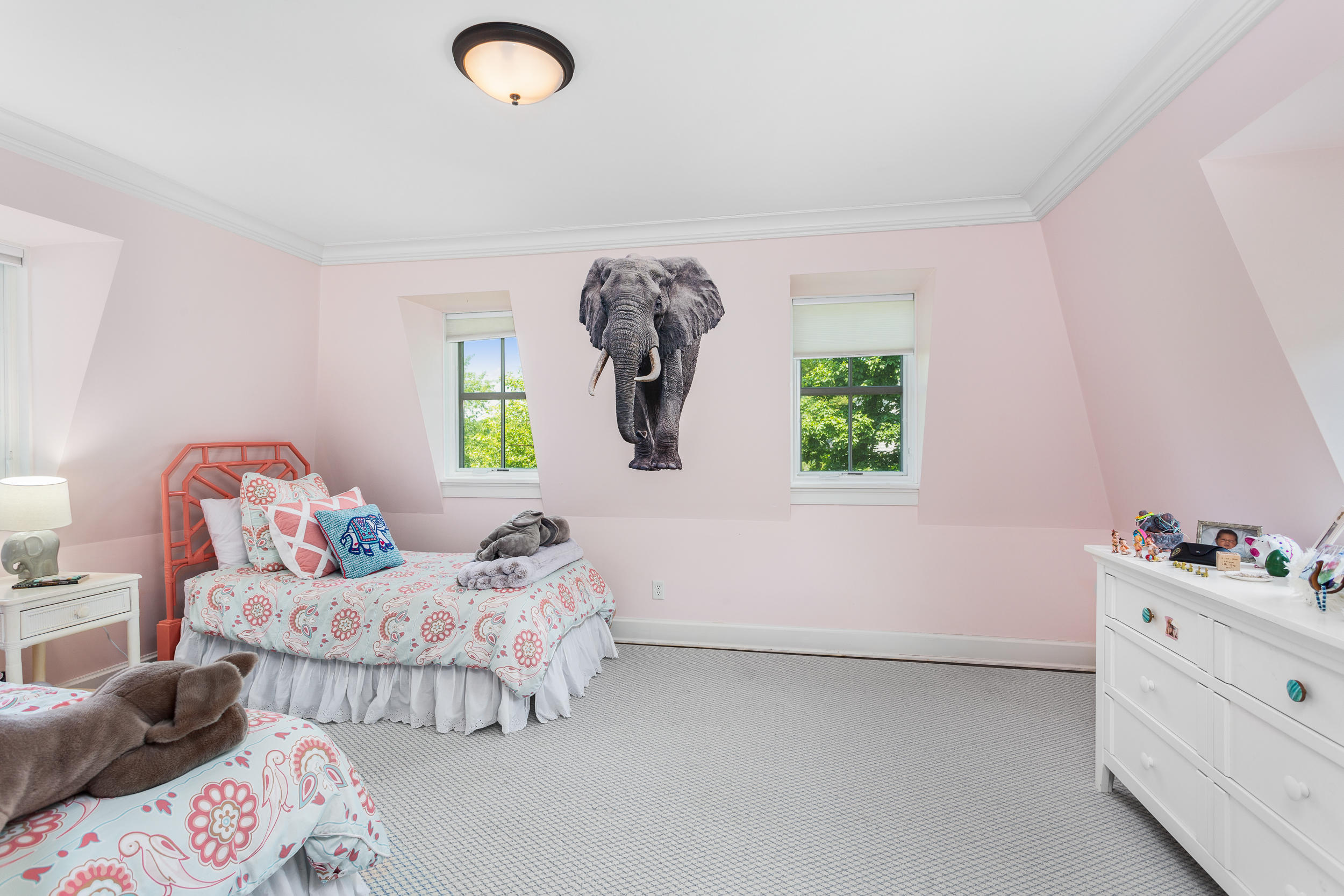 136 Pear Tree Point Road Darien, CT 06820 - Photo 33 of 56 a bedroom with a bed and window