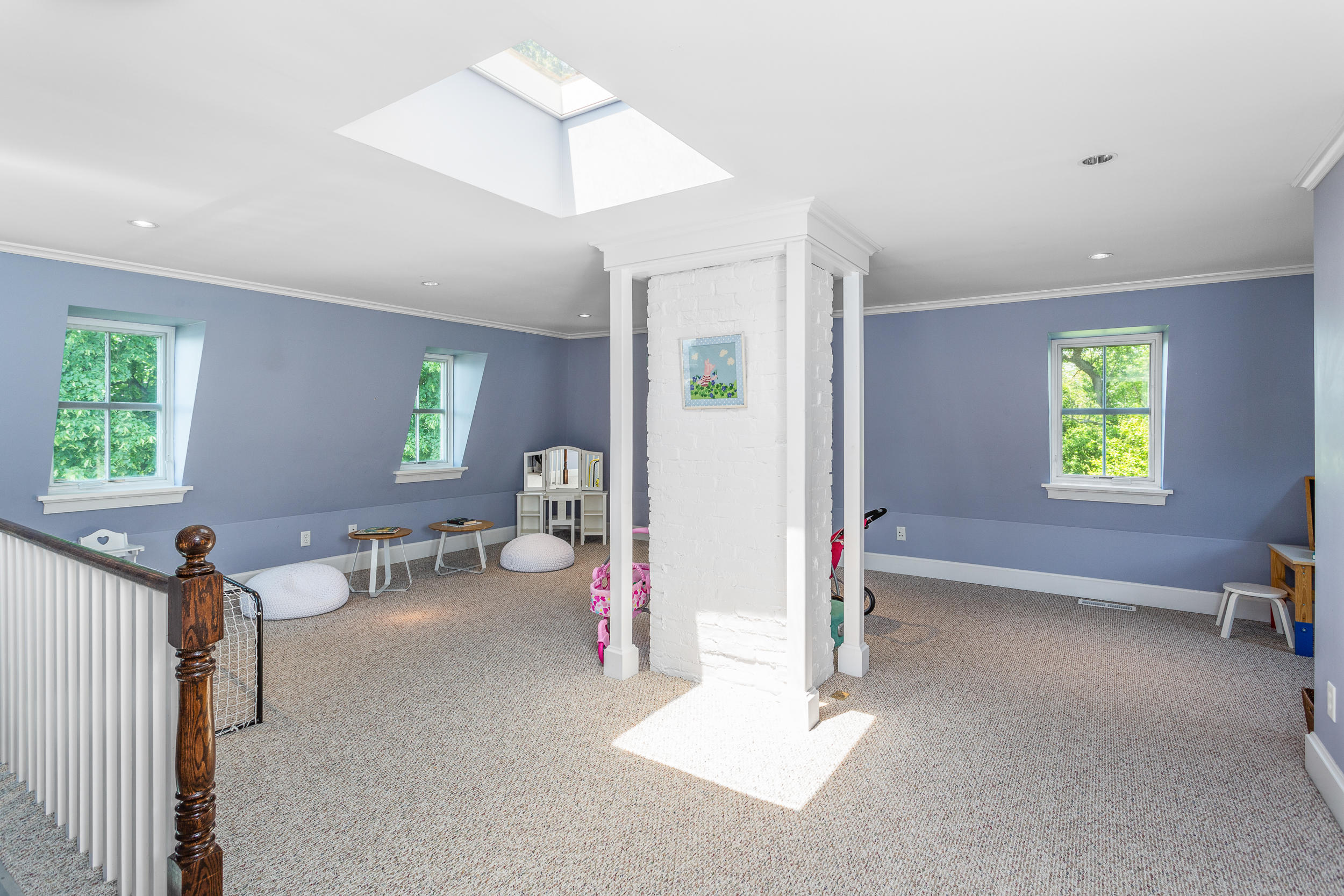 136 Pear Tree Point Road Darien, CT 06820 - Photo 41 of 56 a living room with furniture a window and a table