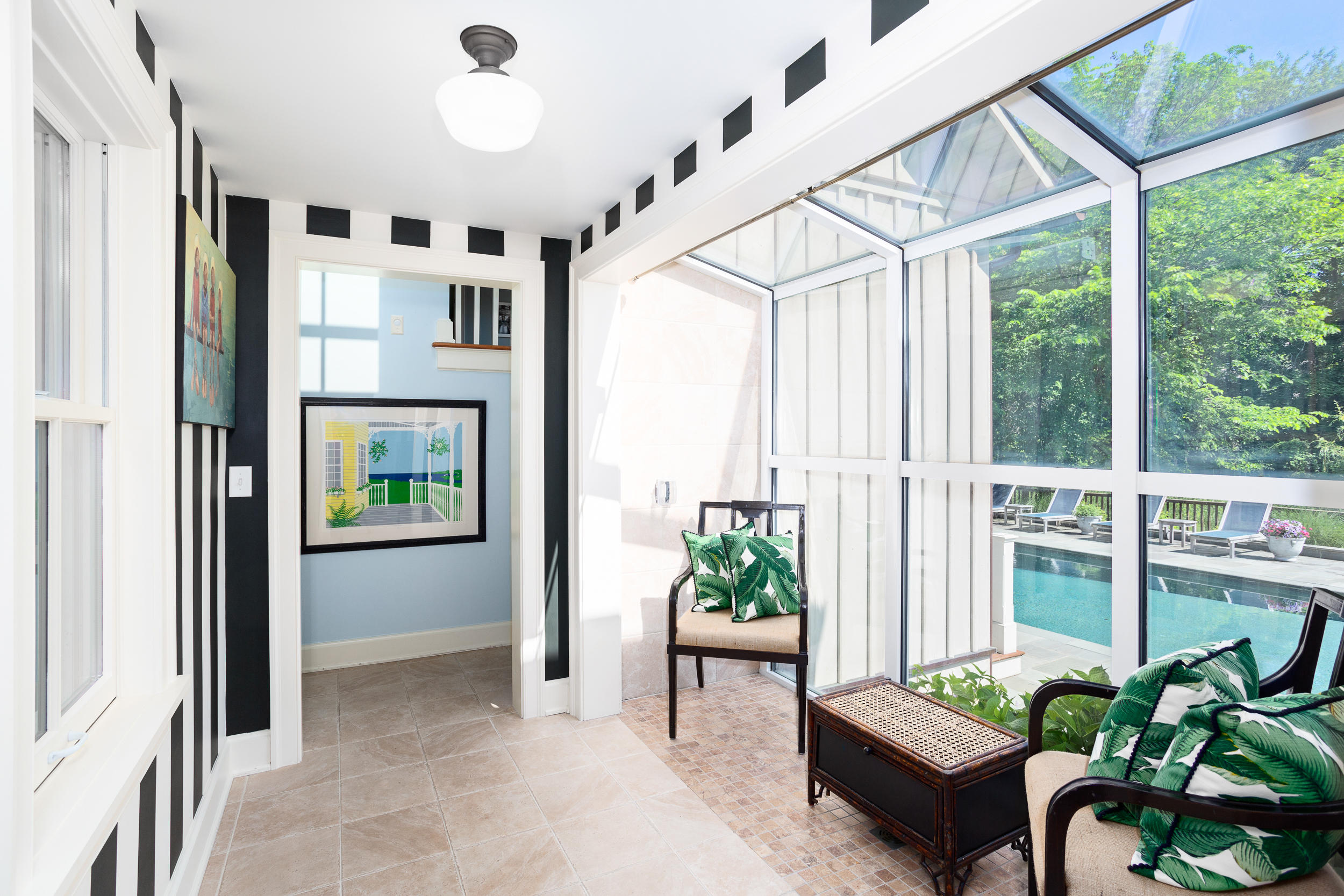 136 Pear Tree Point Road Darien, CT 06820 - Photo 44 of 56 a living room with furniture and a potted plant