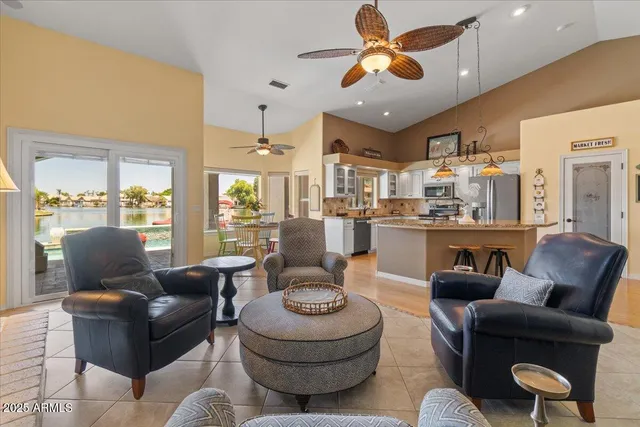 a bathroom with a granite countertop sink toilet a mirror and shower