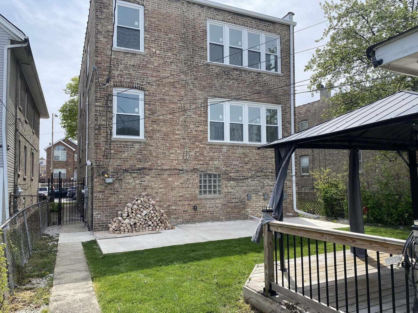 4352 West Augusta Boulevard, Unit 1 Chicago, IL 60651 - Photo 16 of 16 a view of a chair and table in the patio