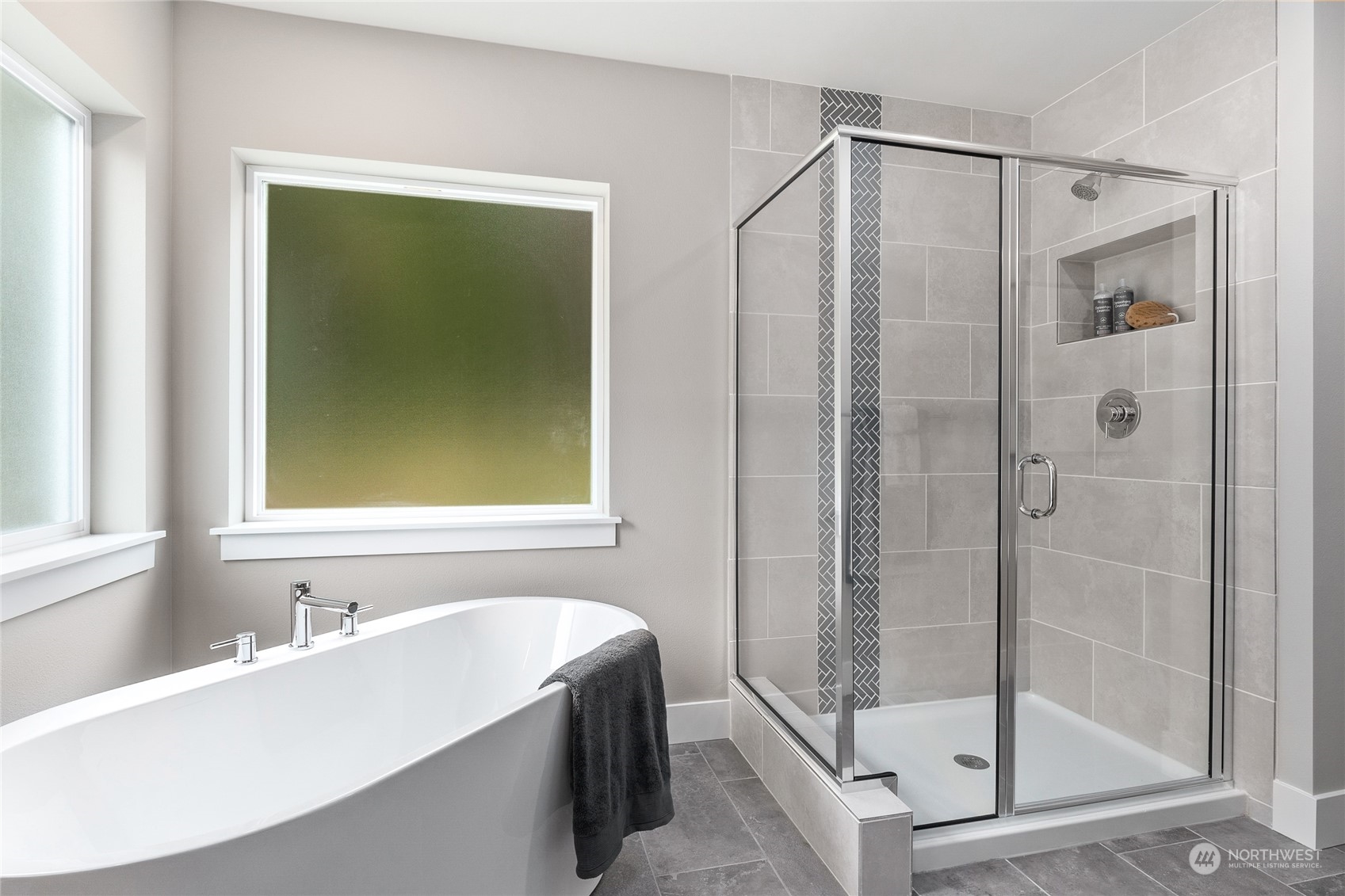 27 177th Street Southeast Bothell, WA 98012 - Photo 24 of 32 a bathroom with a bathtub and a shower