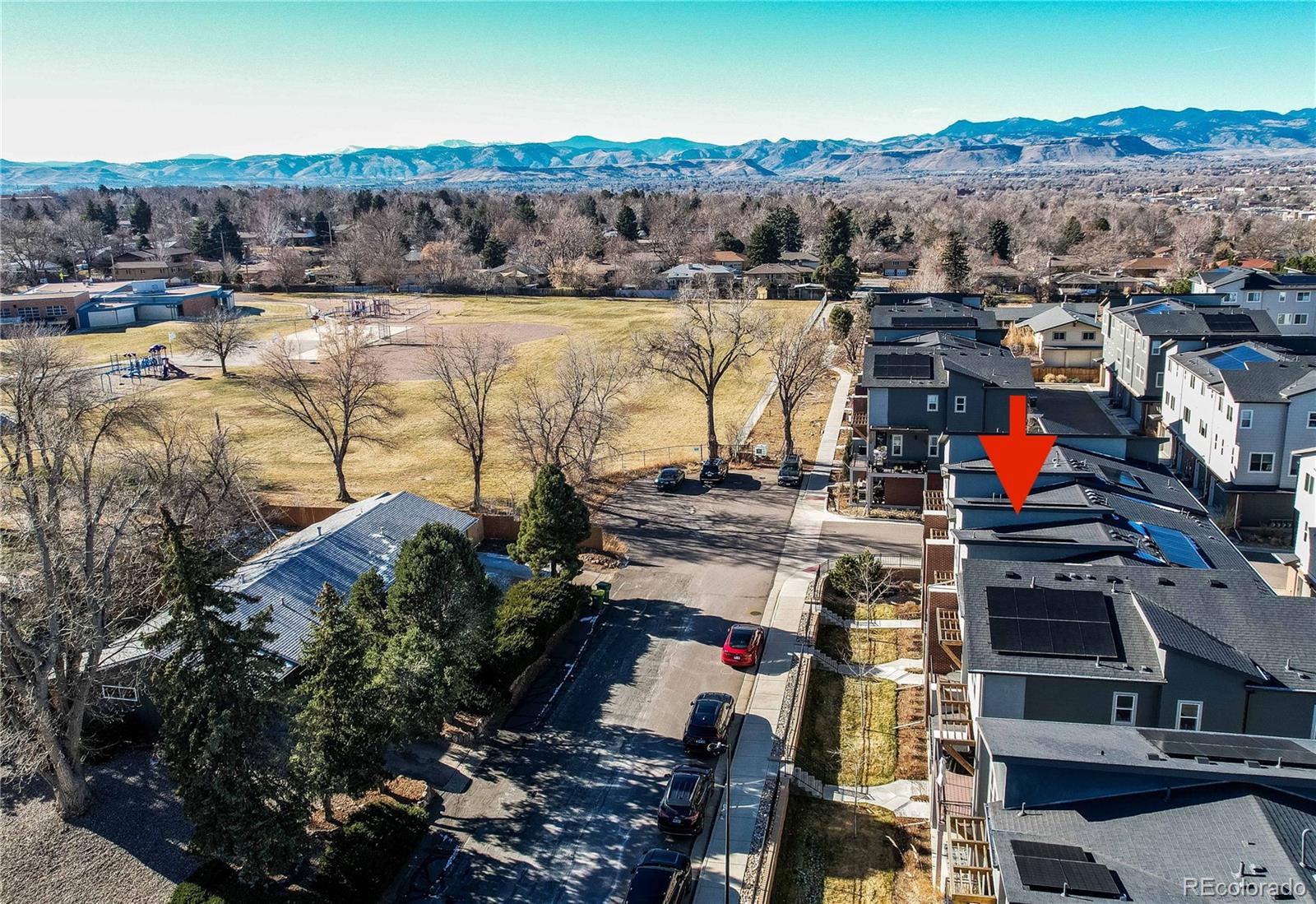 7825 West 42nd Avenue Wheat Ridge, CO 80033 - Photo 2 of 35 a view of lake and mountain