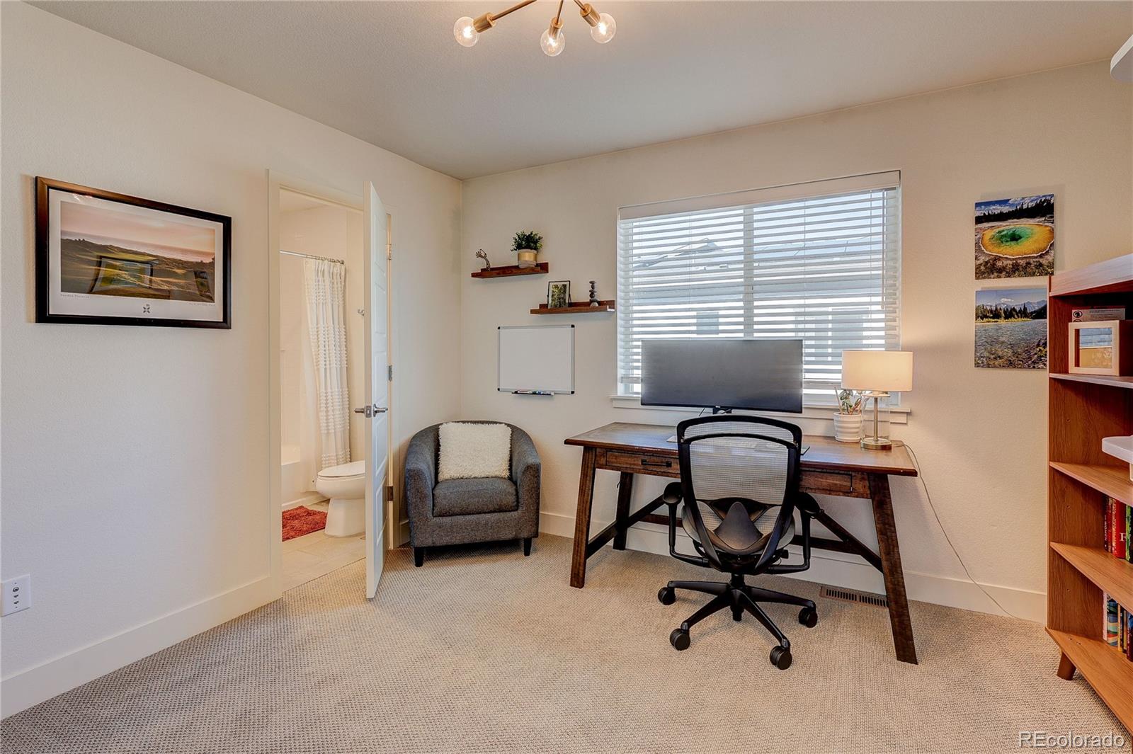 7825 West 42nd Avenue Wheat Ridge, CO 80033 - Photo 23 of 35 a workspace with furniture and a window