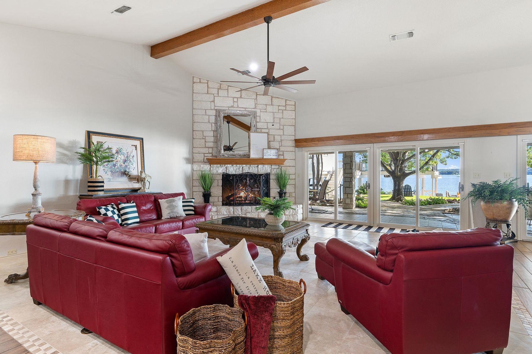 14 Beaver Island Road Granite Shoals, TX 78654 - Photo 15 of 30 a living room with furniture fireplace and a large window