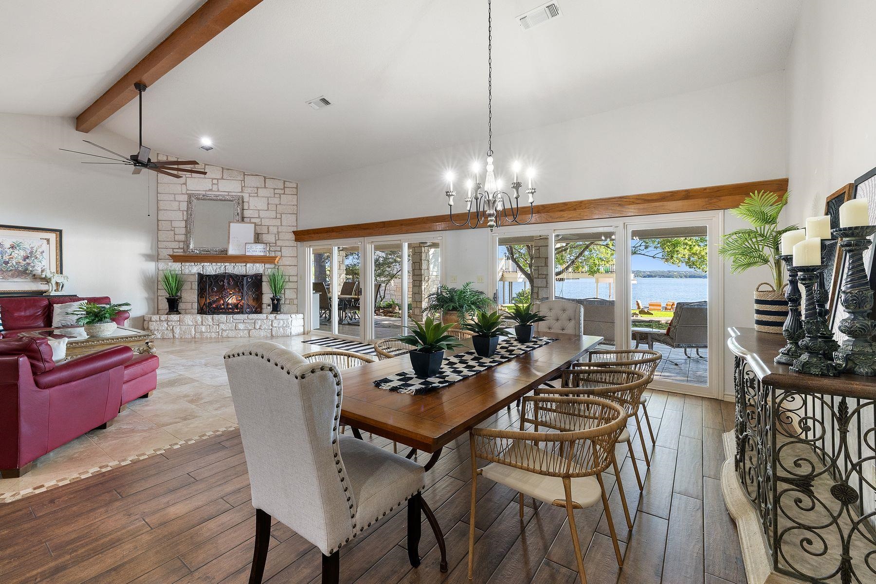 14 Beaver Island Road Granite Shoals, TX 78654 - Photo 20 of 30 a view of a dining room with furniture a livingroom and chandelier