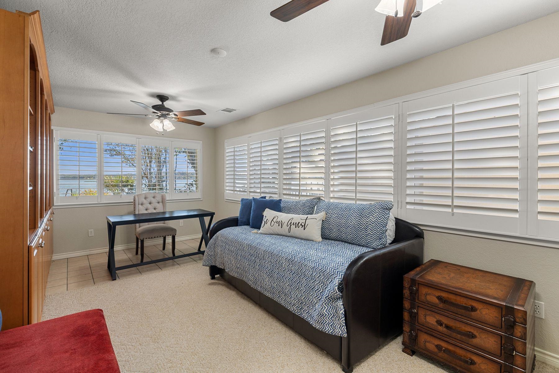 14 Beaver Island Road Granite Shoals, TX 78654 - Photo 27 of 30 a bedroom with furniture and a window