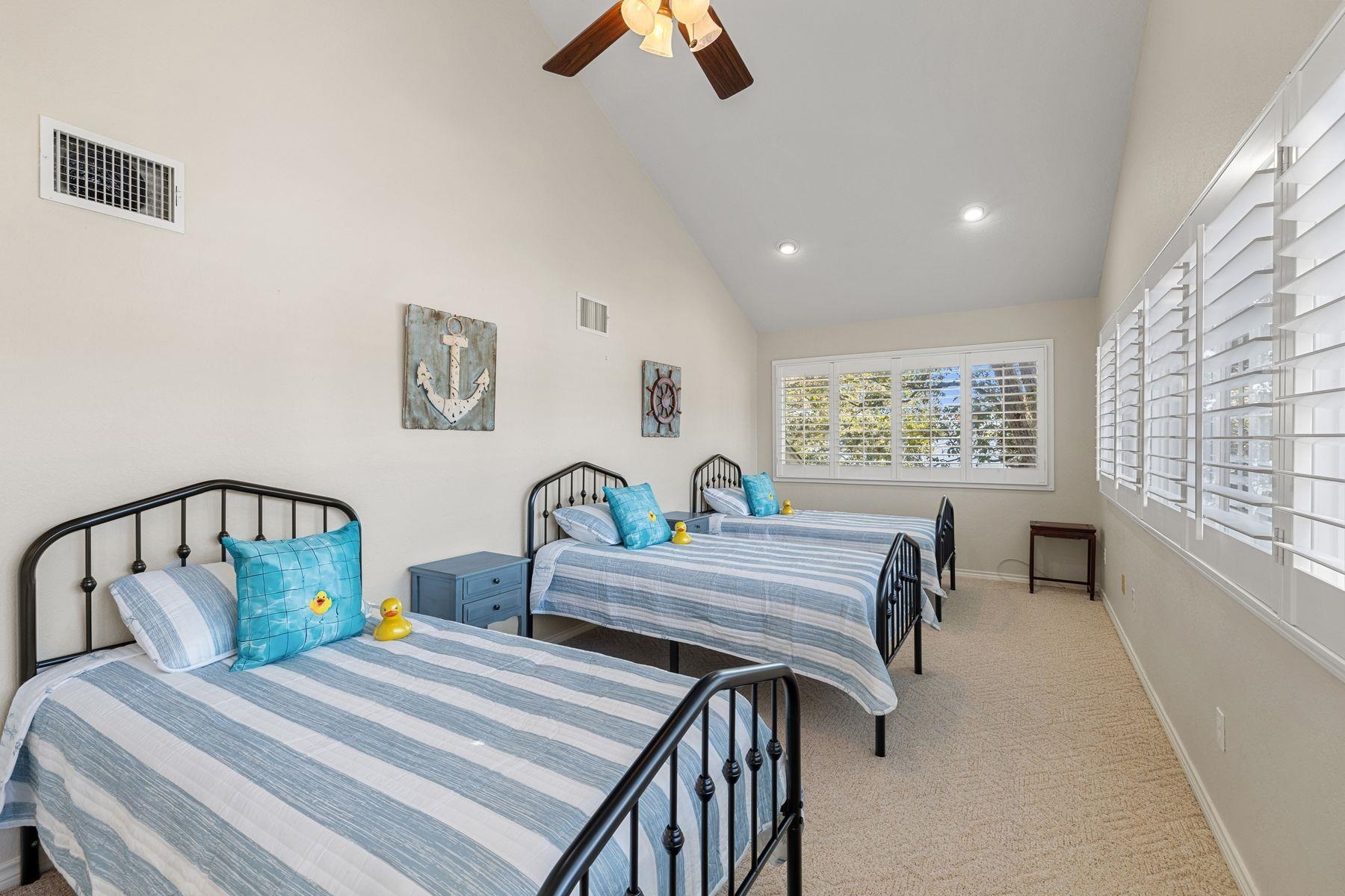 14 Beaver Island Road Granite Shoals, TX 78654 - Photo 28 of 30 a bedroom with furniture and a window