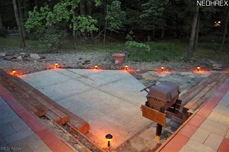 17413 Ridge Creek Road Strongsville, OH 44136 - Photo 18 of 18 Night Lighting Show Off The Nice Size Patio With Built-In Gas Grill