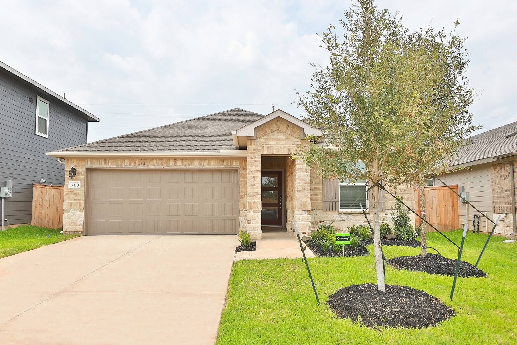 14110 Greystone Ter Street Magnolia, TX 77354 - Photo 1 of 34 Enjoy Beautiful Curb Appeal With This Brick And Stone Elevation From Meritage Homes In Convenient Magnolia Place. The Home Is Located Off Of FM 1488 And Spur 149 And Is Just A Couple Of Miles East From SH 249.