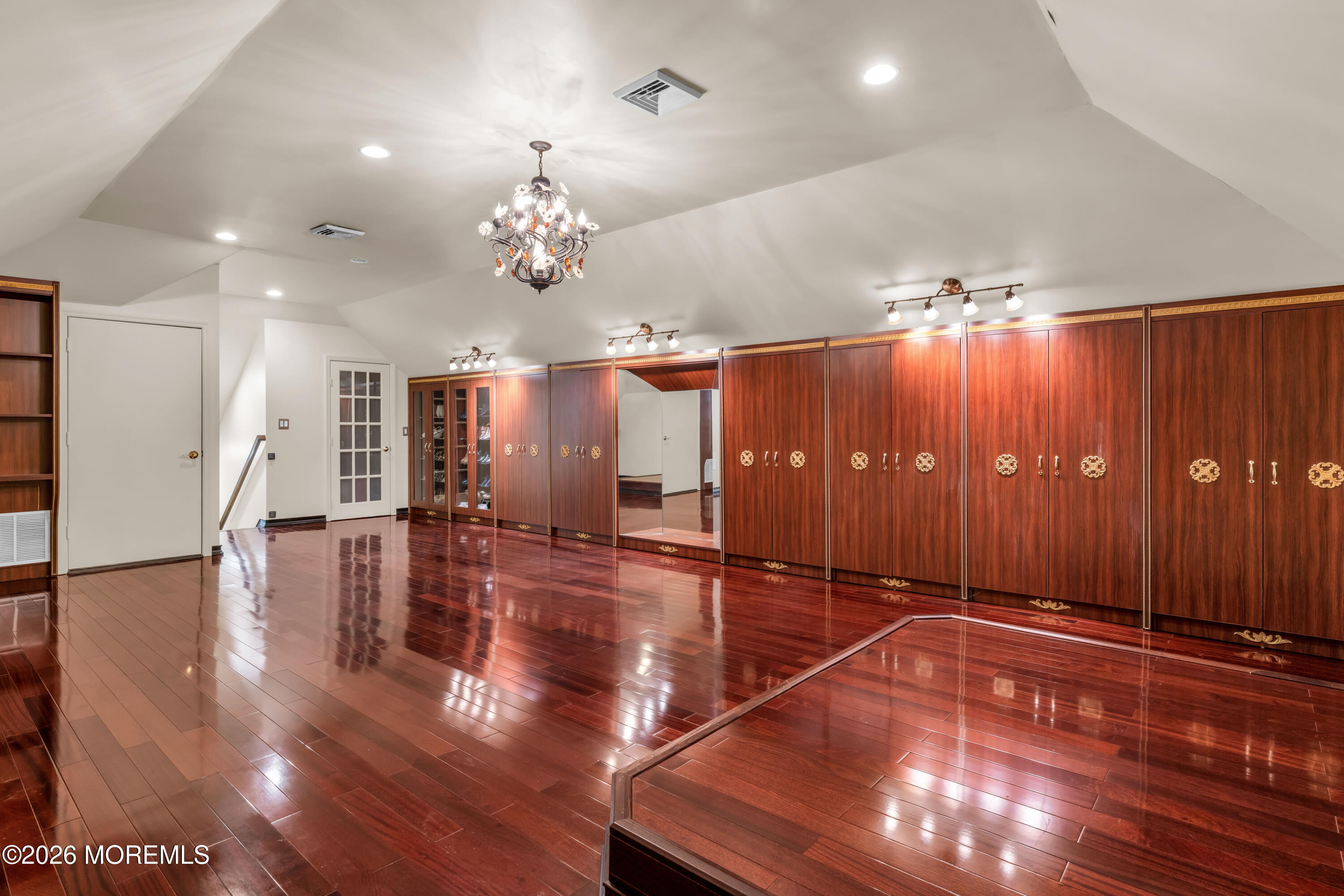 60 Yellow Meetinghouse Road Cream Ridge, NJ 08514 - Photo 46 of 59 a view of a room with lots of shelves and wooden floor