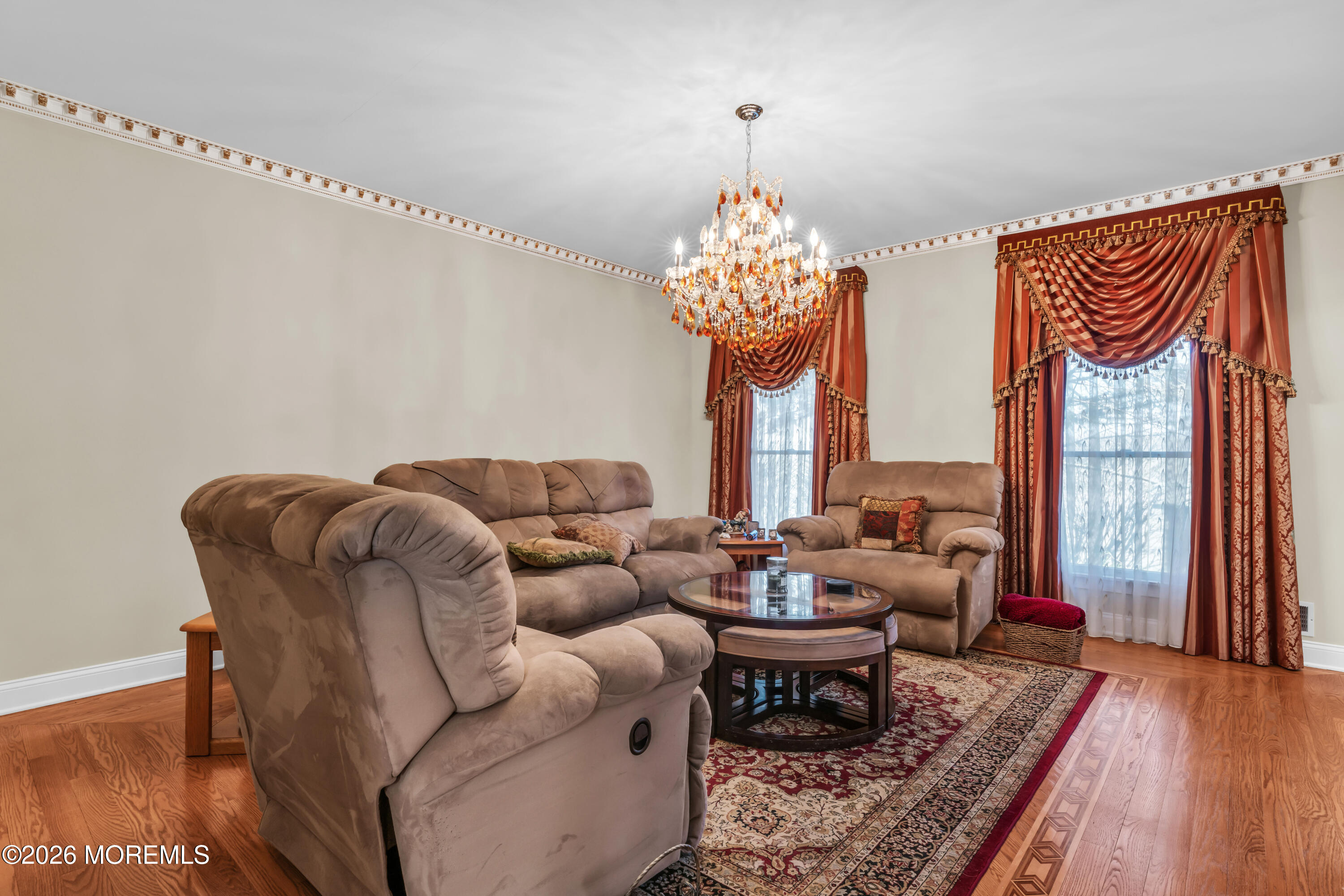 60 Yellow Meetinghouse Road Cream Ridge, NJ 08514 - Photo 55 of 59 a living room with furniture a chandelier and a table