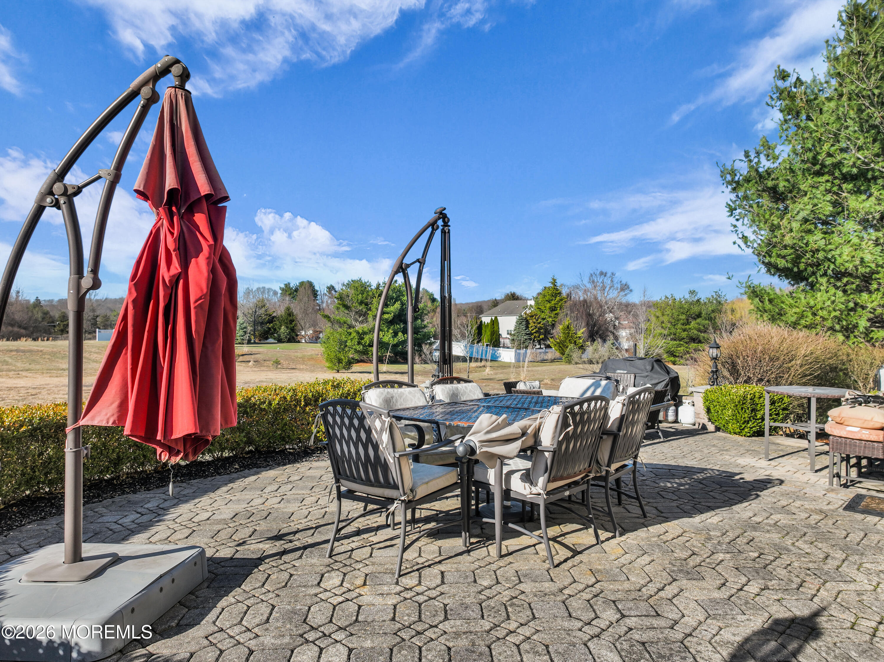 60 Yellow Meetinghouse Road Cream Ridge, NJ 08514 - Photo 10 of 59 a view of a patio with a dining table and chairs