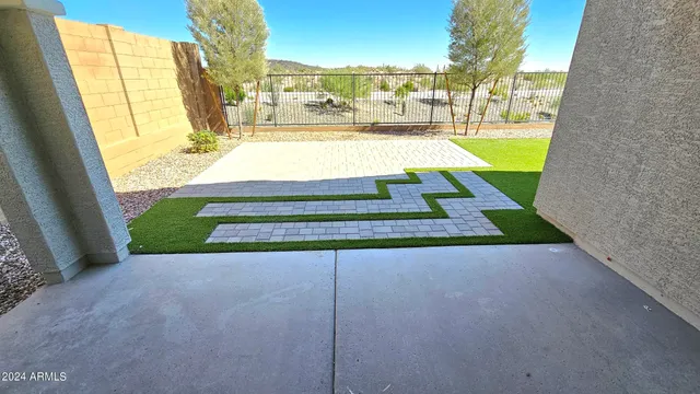 a view of a backyard with a slide