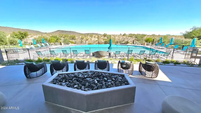 a view of a two chairs in the roof deck