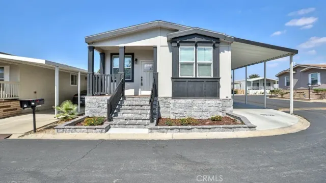 a front view of a house with porch