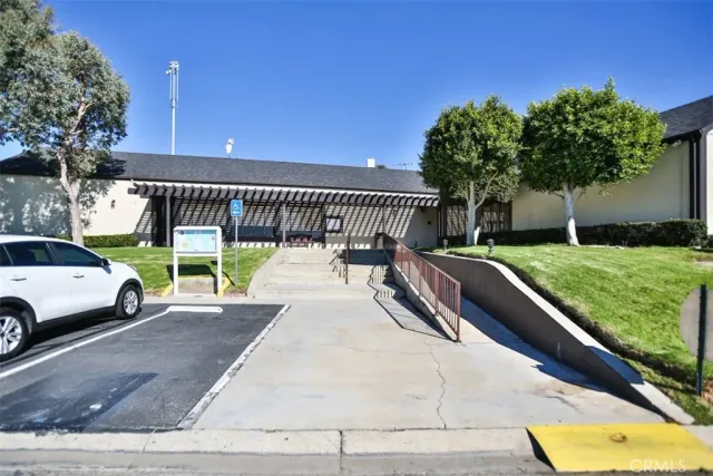 a view of a patio with swimming pool
