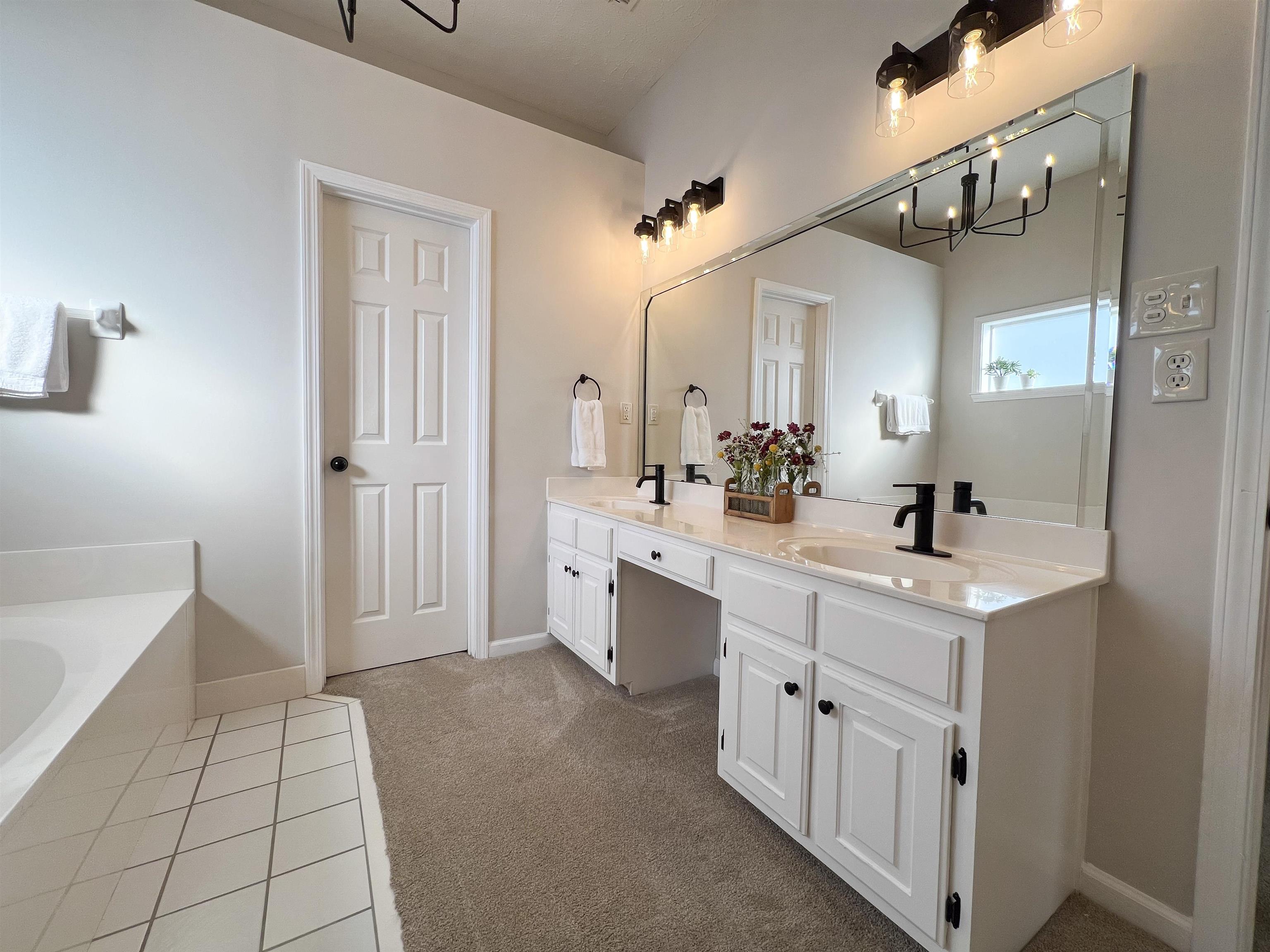 503 Old Collierville-arlin Road Collierville, TN 38017 - Photo 20 of 37 a spacious bathroom with a double vanity sink mirror and
