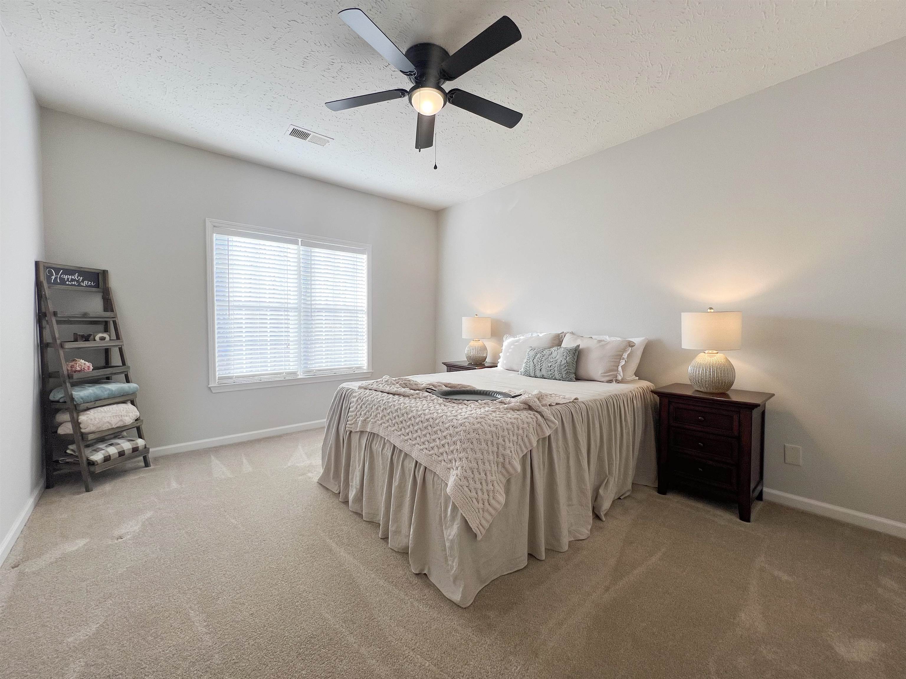 503 Old Collierville-arlin Road Collierville, TN 38017 - Photo 29 of 37 a bedroom with a bed and a ceiling fan
