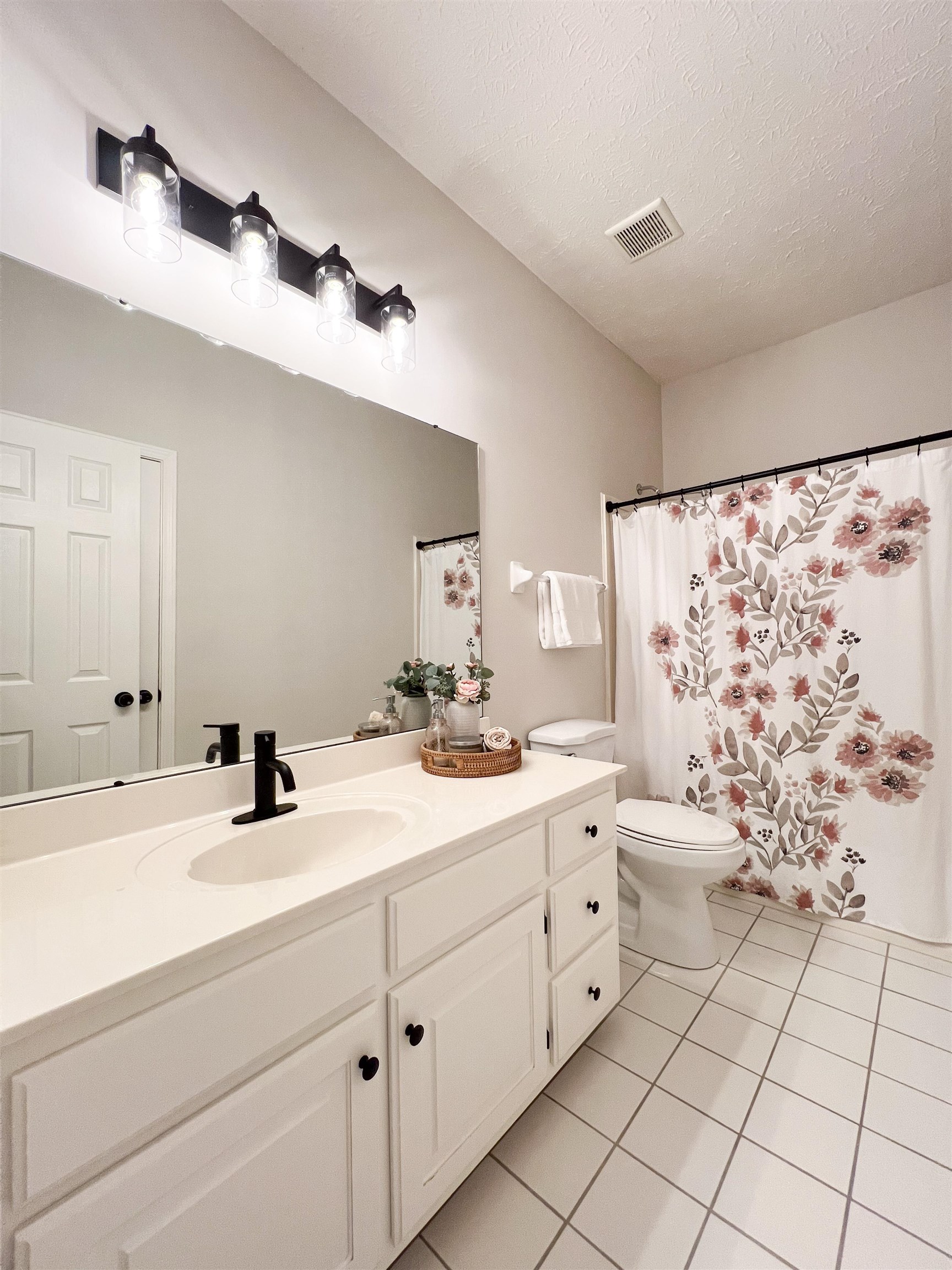 503 Old Collierville-arlin Road Collierville, TN 38017 - Photo 30 of 37 a bathroom with a double vanity sink mirror and toilet