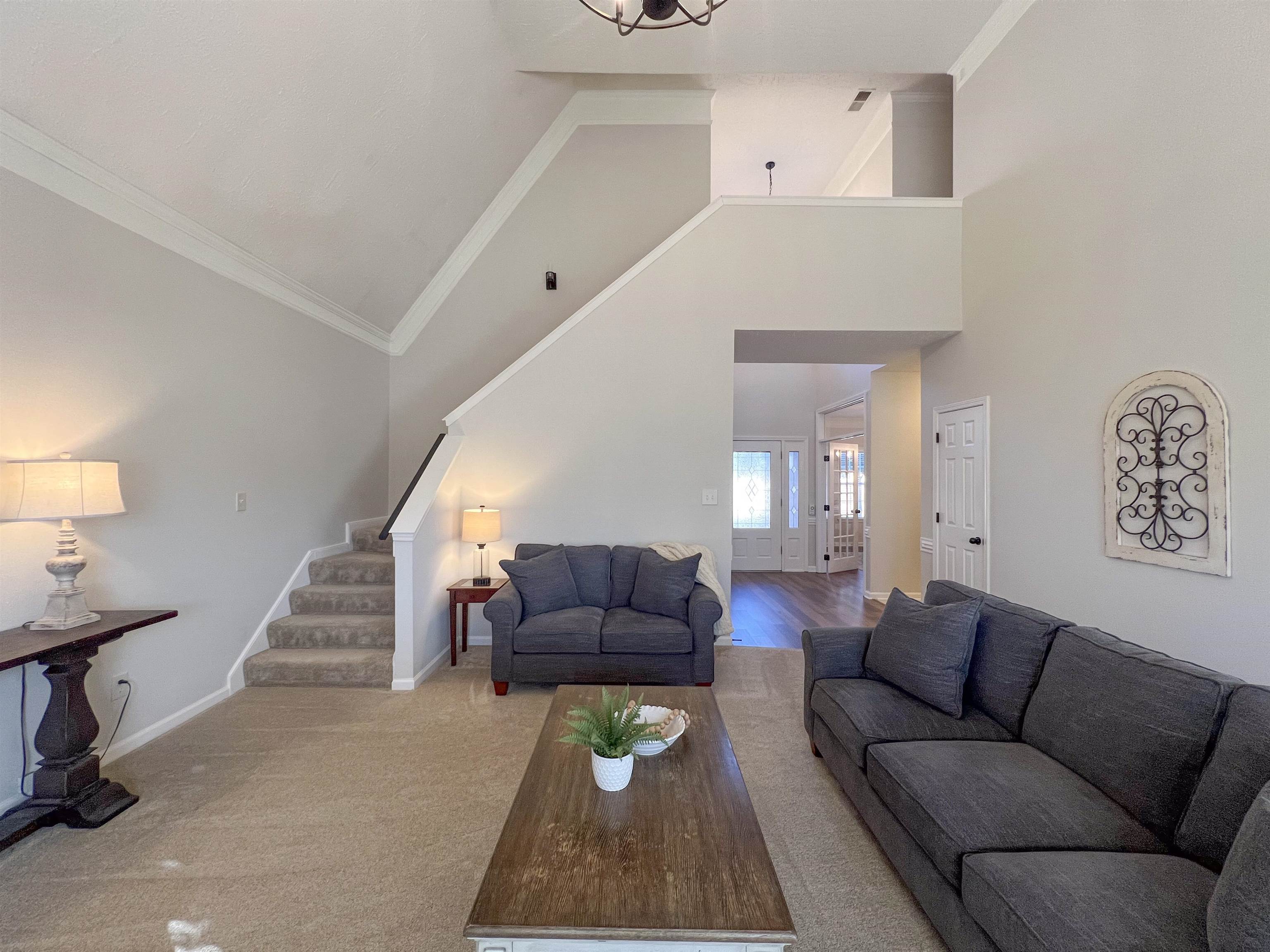 503 Old Collierville-arlin Road Collierville, TN 38017 - Photo 5 of 37 a living room with furniture and a stairs