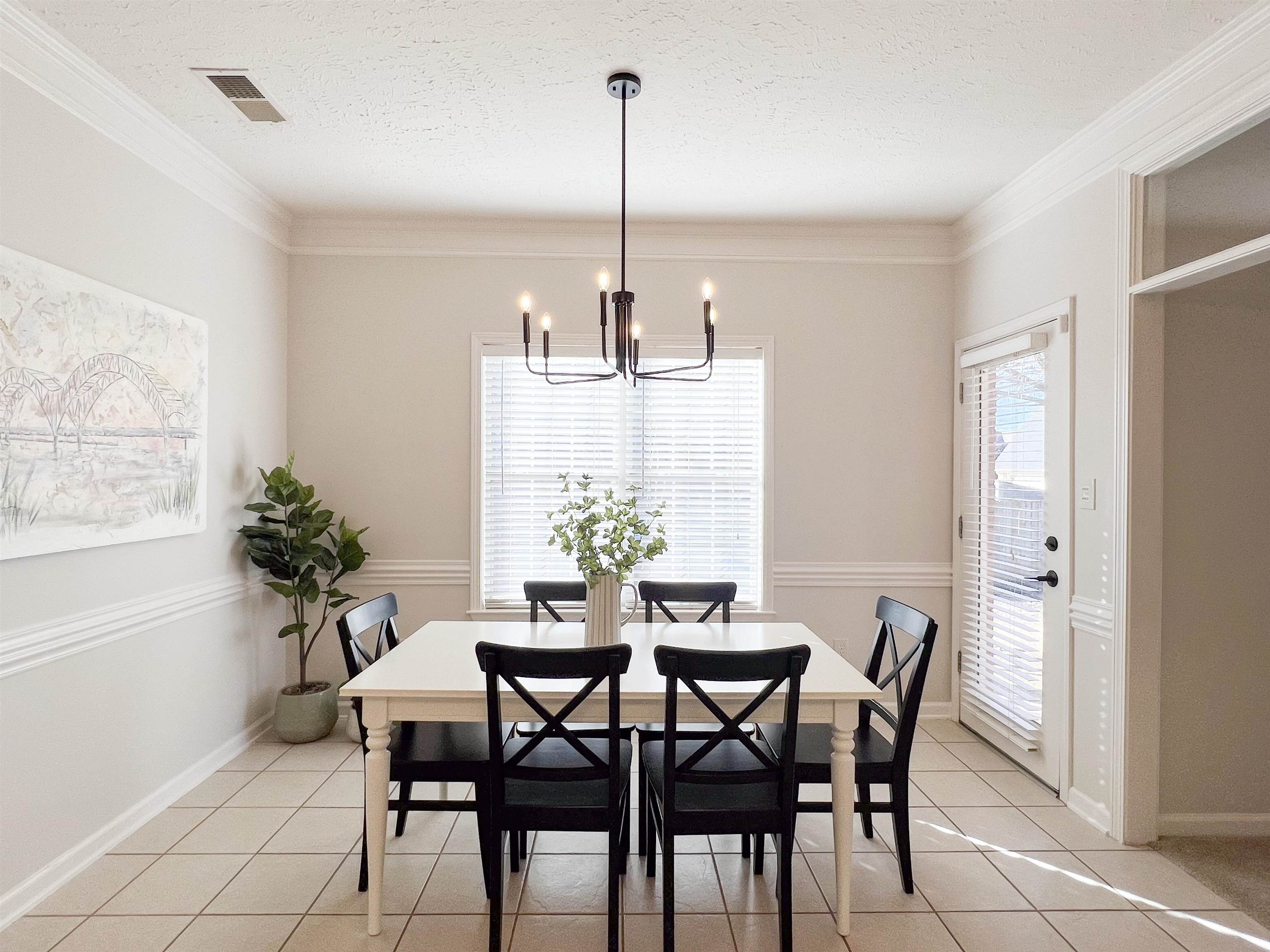503 Old Collierville-arlin Road Collierville, TN 38017 - Photo 10 of 37 a view of a dining room with furniture window and outside view
