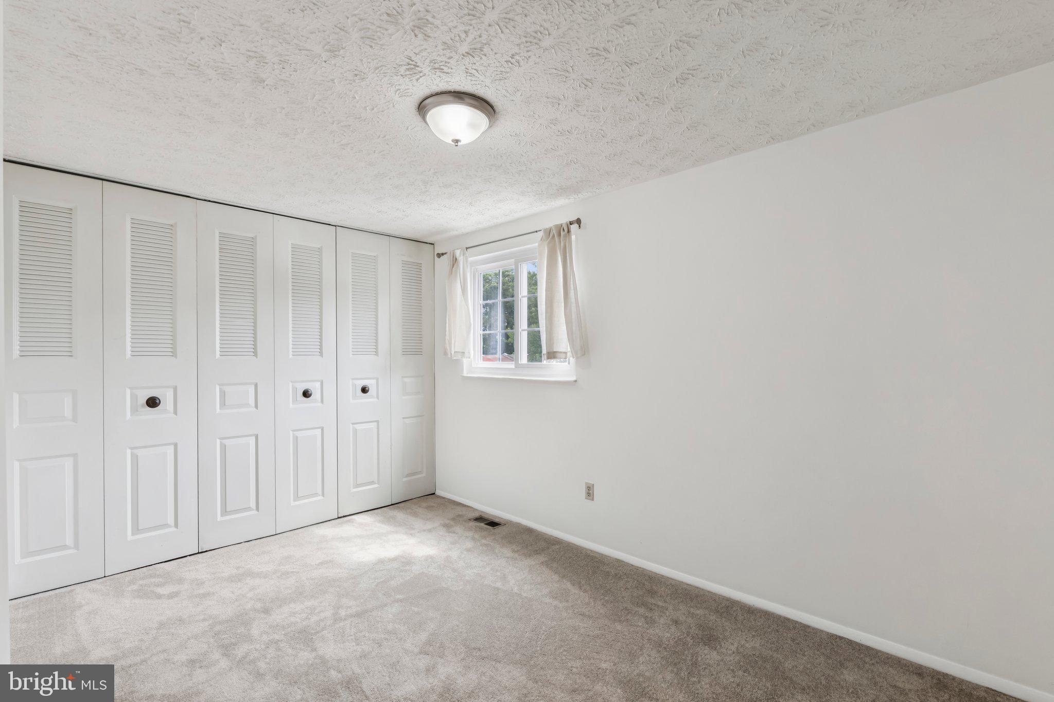 8277 Crestmont Circle Springfield, VA 22153 - Photo 16 of 23 a view of an empty room