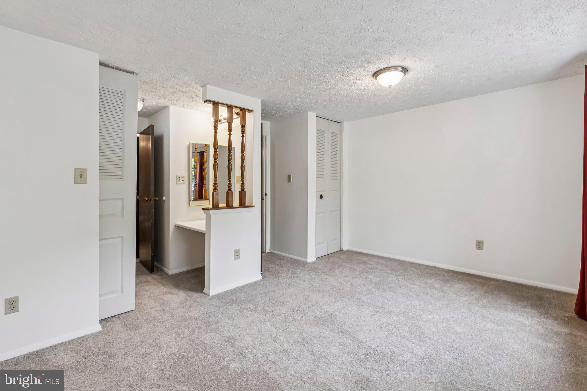 8277 Crestmont Circle Springfield, VA 22153 - Photo 10 of 23 an empty room with closet