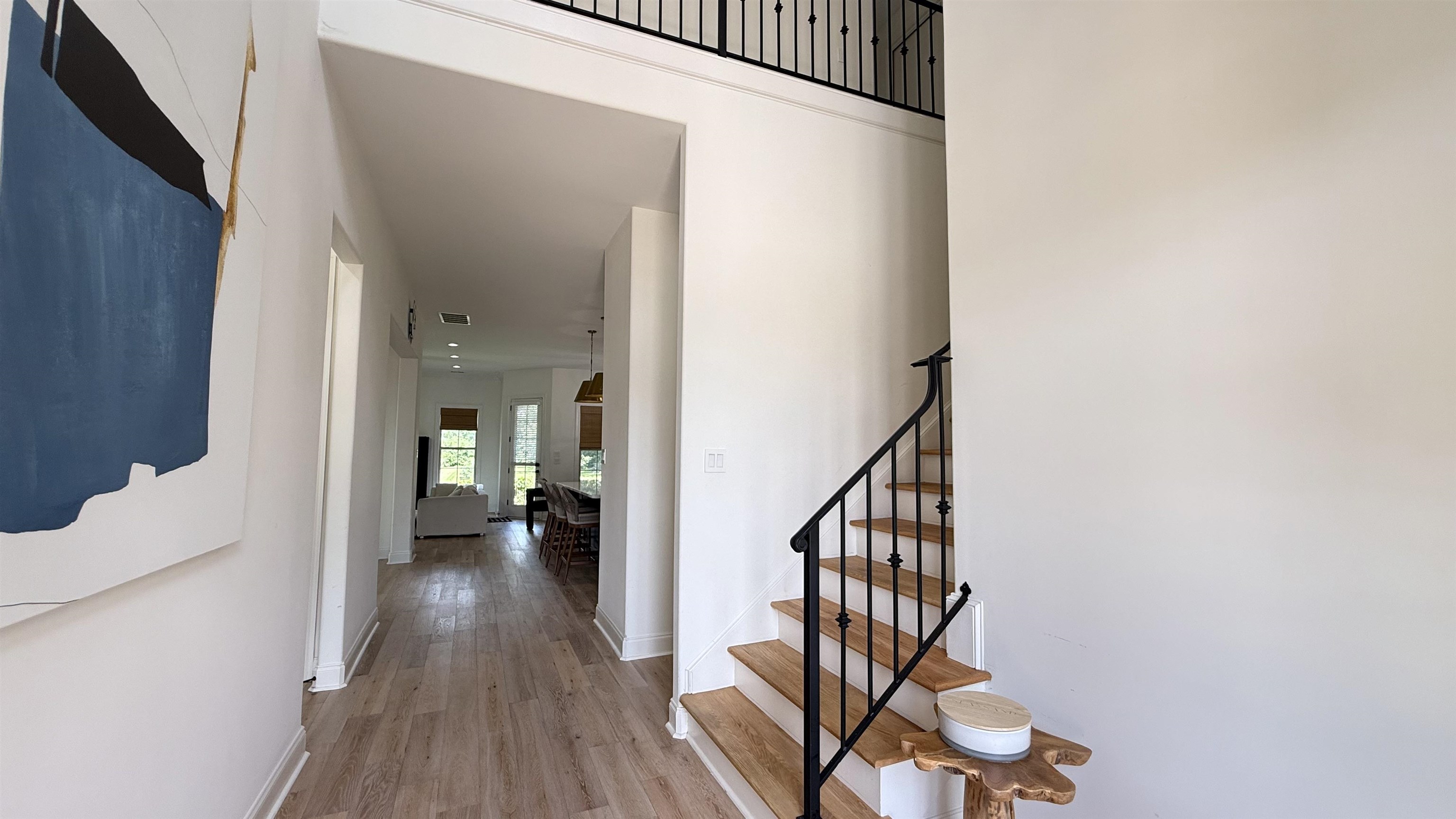 1746 Chadwick Farms Loop North Collierville, TN 38017 - Photo 5 of 35 Staircase with wood finished floors and baseboards