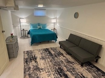 70 Clay Pond Road, Unit B Bourne, MA 02532 - Photo 4 of 9 a living room with a couch and a couch