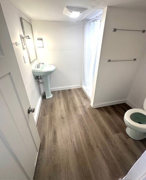 70 Clay Pond Road, Unit B Bourne, MA 02532 - Photo 7 of 9 a bathroom with a sink and mirror