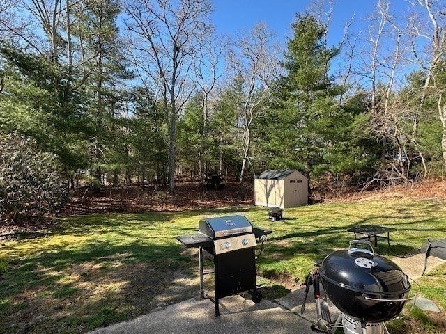 70 Clay Pond Road, Unit B Bourne, MA 02532 - Photo 9 of 9 a view of a swimming pool with a patio