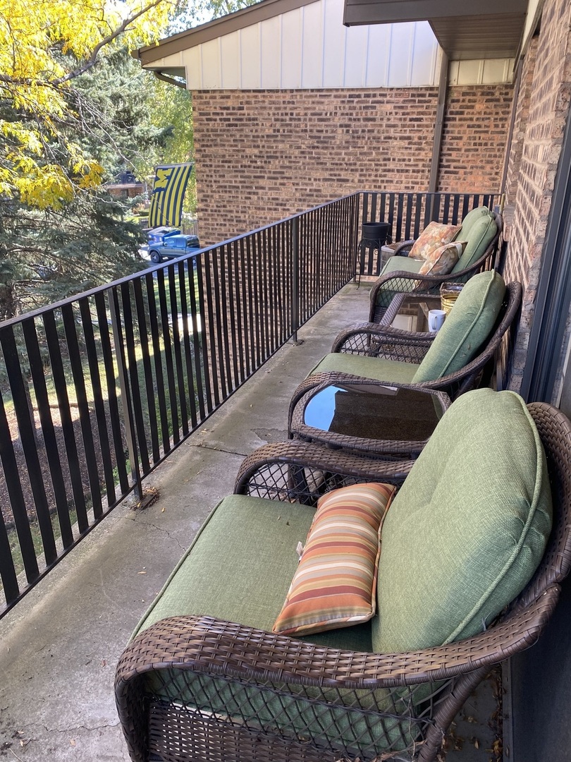 5221 James Lane, Unit 1511 Crestwood, IL 60418 - Photo 11 of 13 a view of balcony with wooden floor