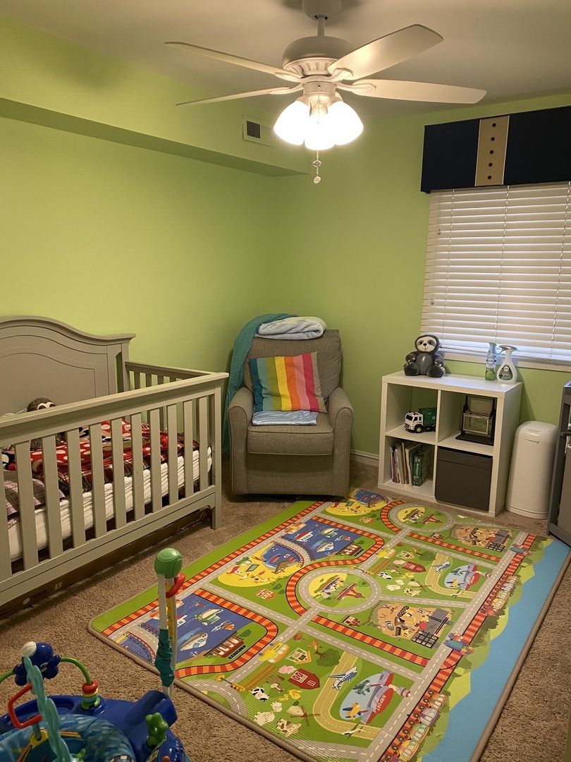5221 James Lane, Unit 1511 Crestwood, IL 60418 - Photo 4 of 13 a living room with pool table and a flat screen tv