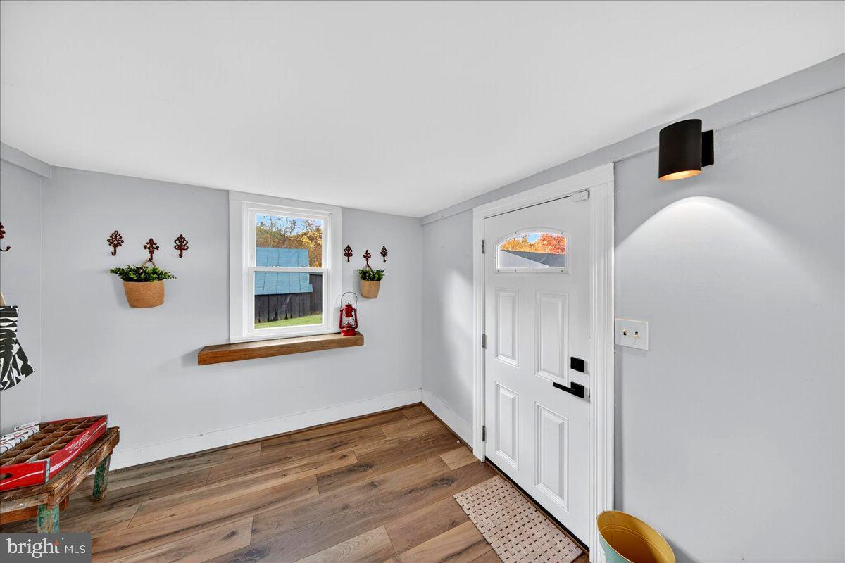 290 Riley Hollow Road Huntly, VA 22640 - Photo 26 of 148 a view of a hallway with interior of the house