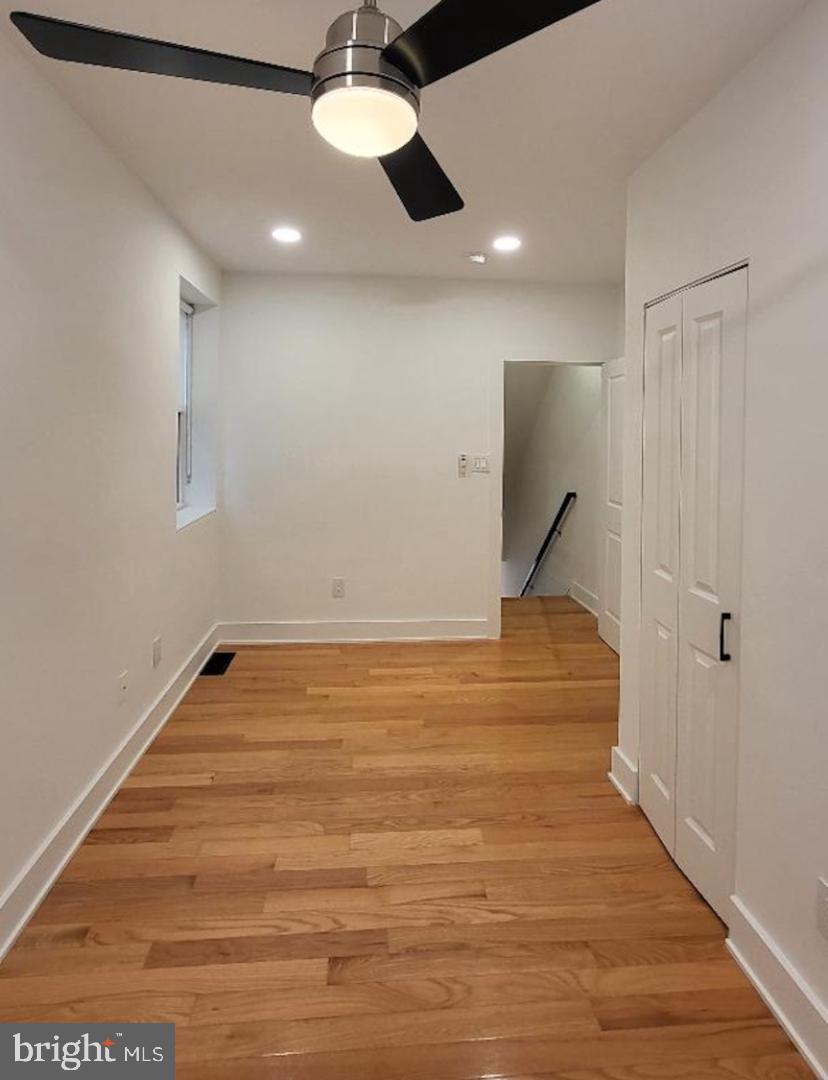 1237 South 27th Street Philadelphia, PA 19146 - Photo 17 of 36 a view of a room with wooden floor