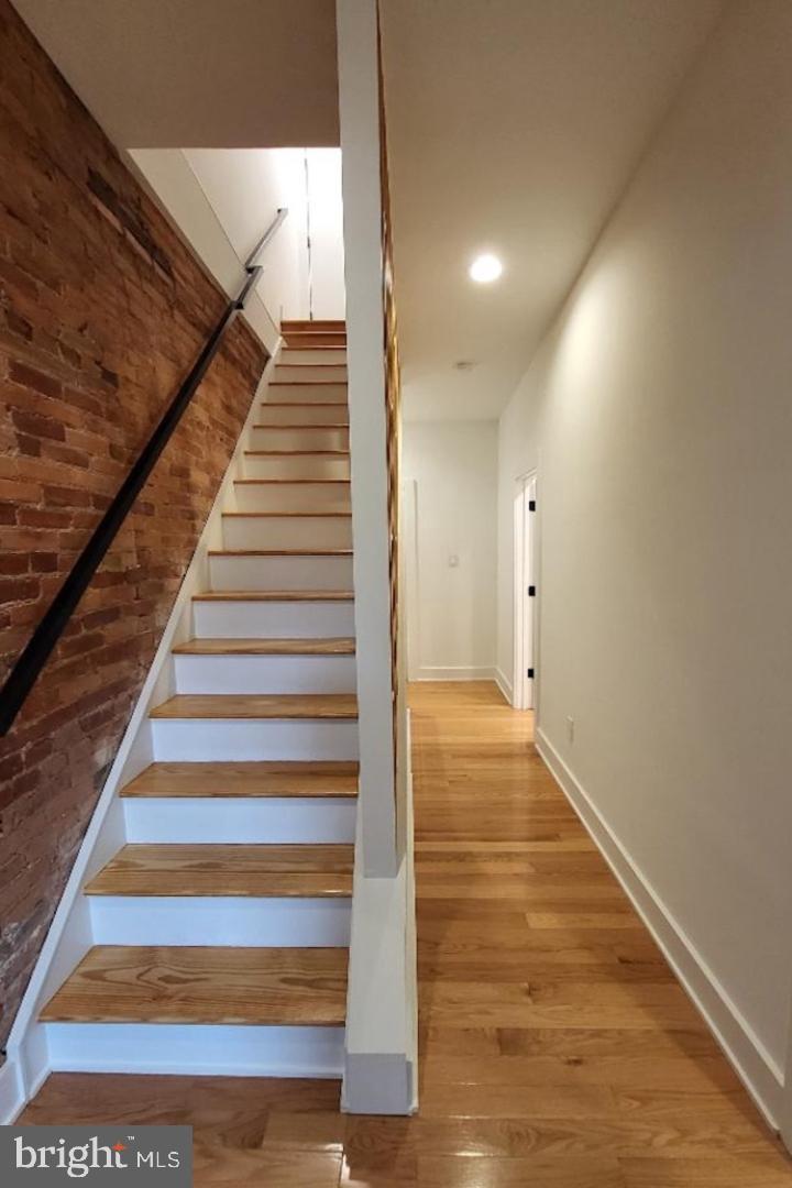 1237 South 27th Street Philadelphia, PA 19146 - Photo 26 of 36 a view of entryway and hall with wooden floor